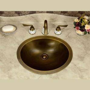 A bathroom sink made of Bronze material