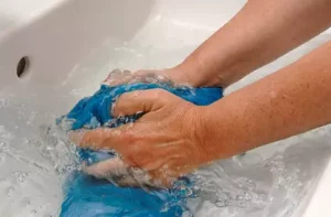 Washing Clothes in a tub